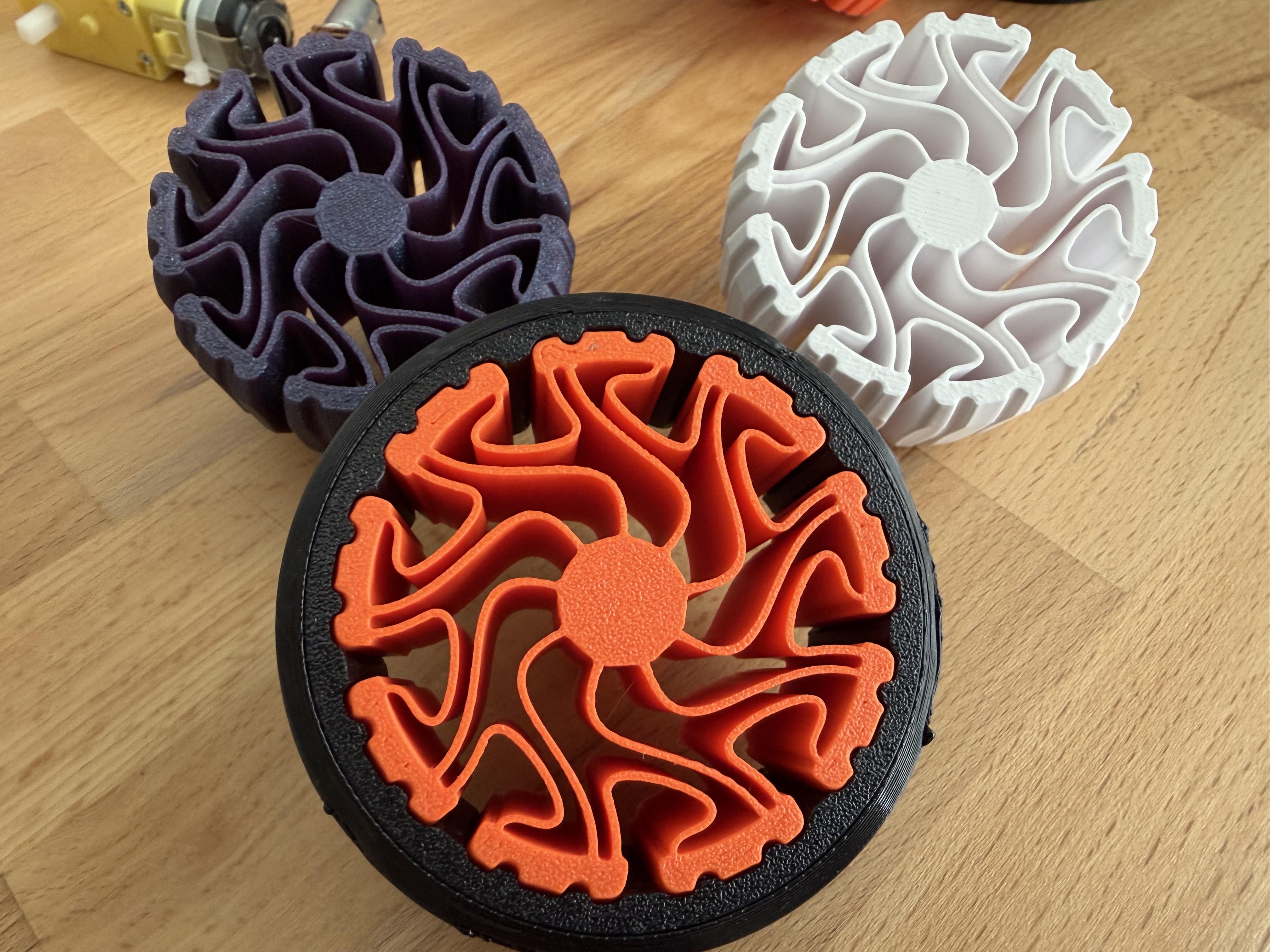 3D printed reaction-diffusion compliant robot wheel with curved internal spokes